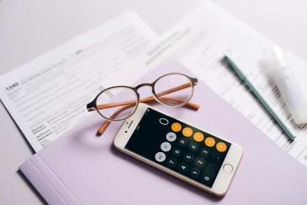 A Close-Up Shot of a Smartphone with an Open Calculator App